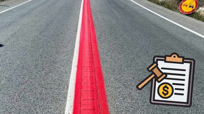Línea roja en la carretera